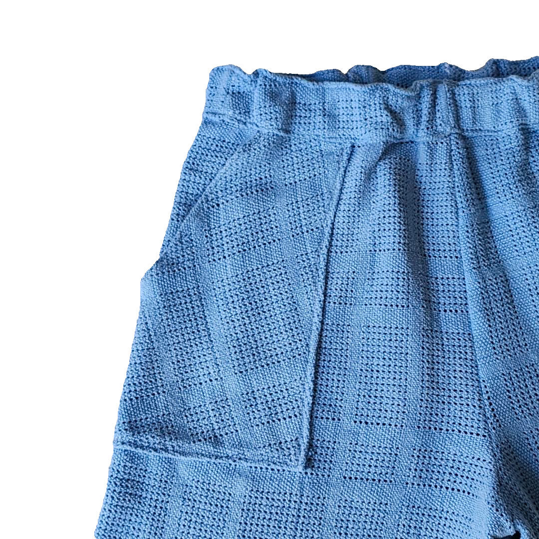 Shorts tipo manta “Los cielos son azules”